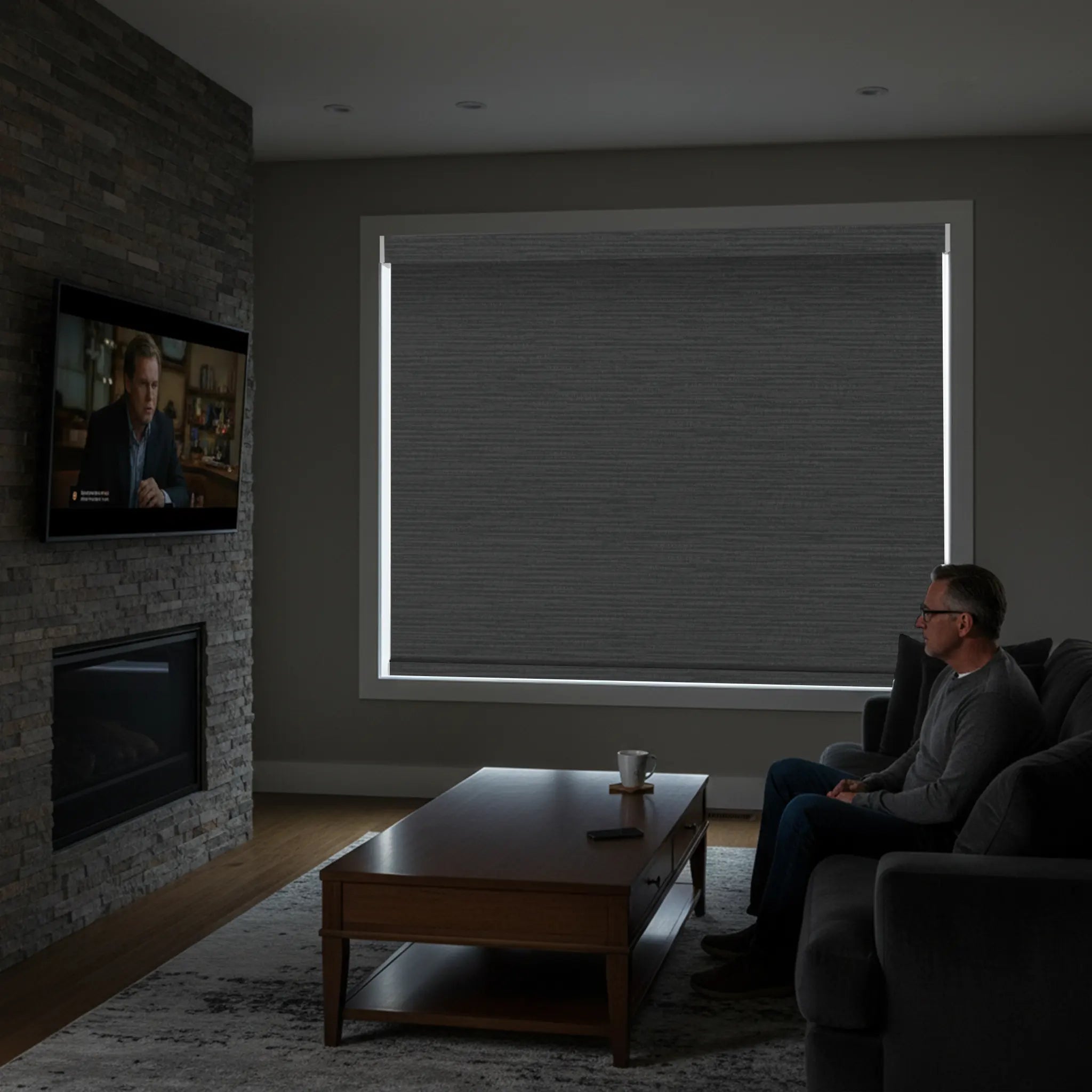 Modern living room with motorized blackout shades installed