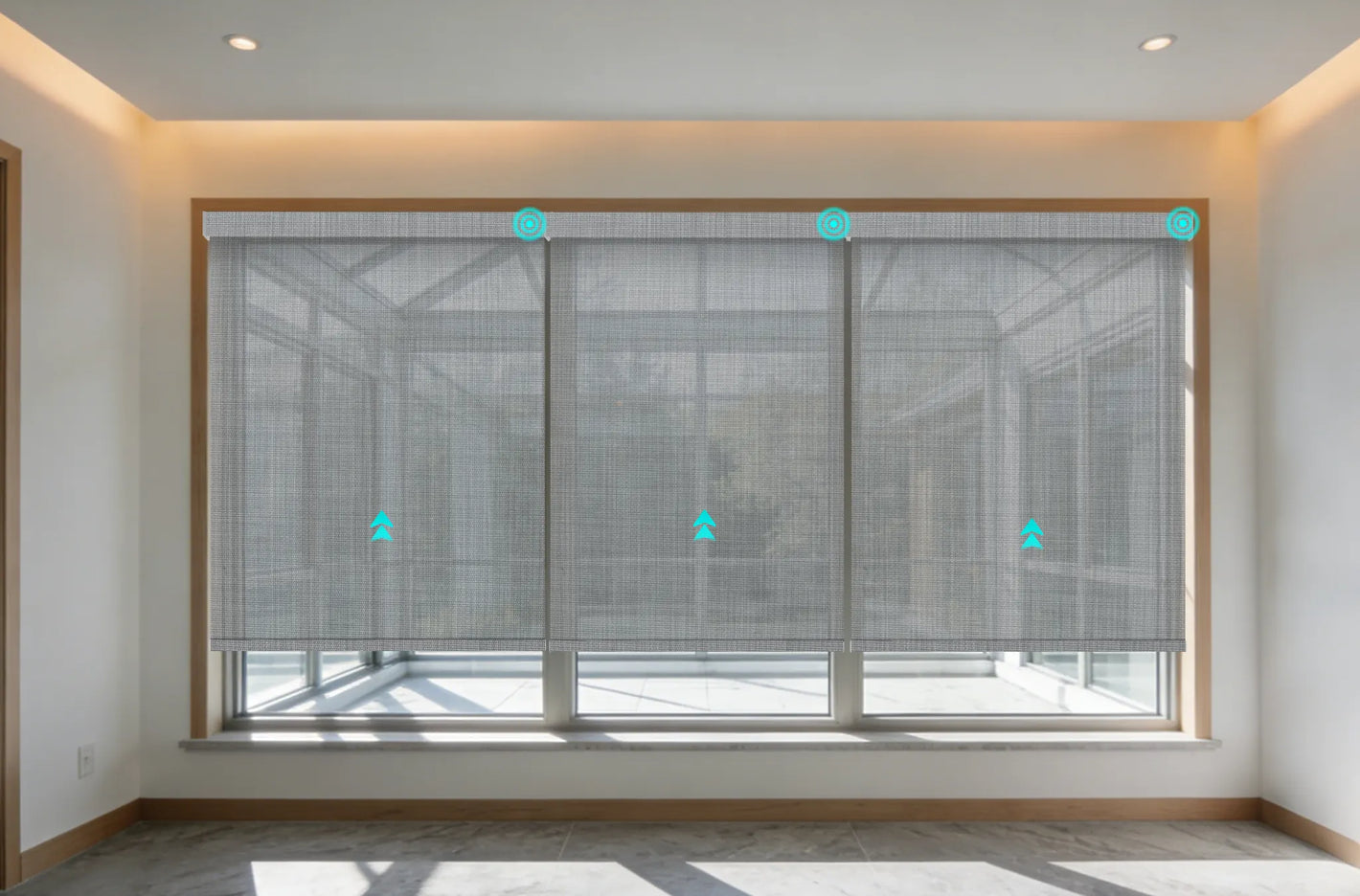 Motorized solar roller shades installed in modern sunroom with large glass windows