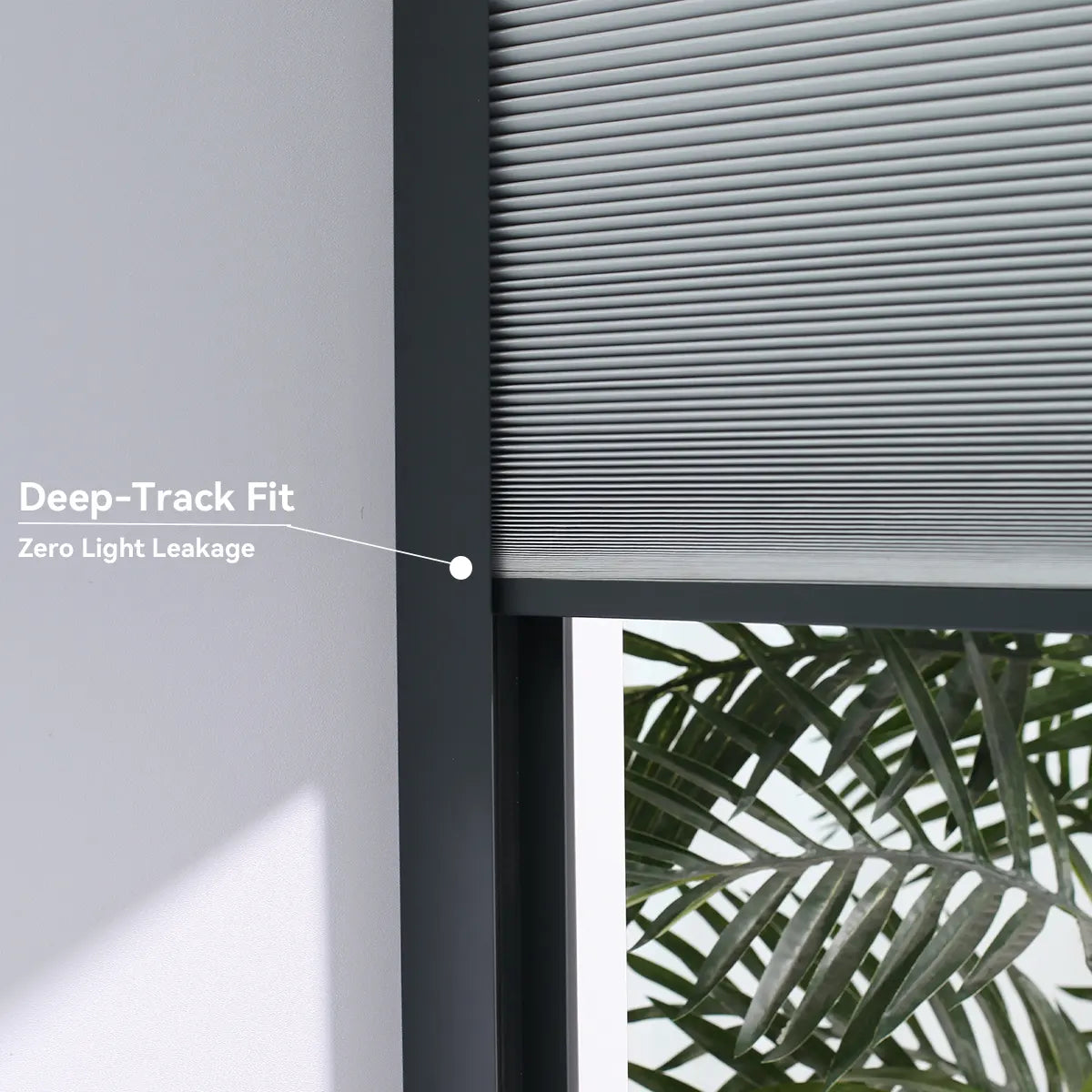 Close-up detail showing the blackout fabric inserted deep into the motorized side track channel.