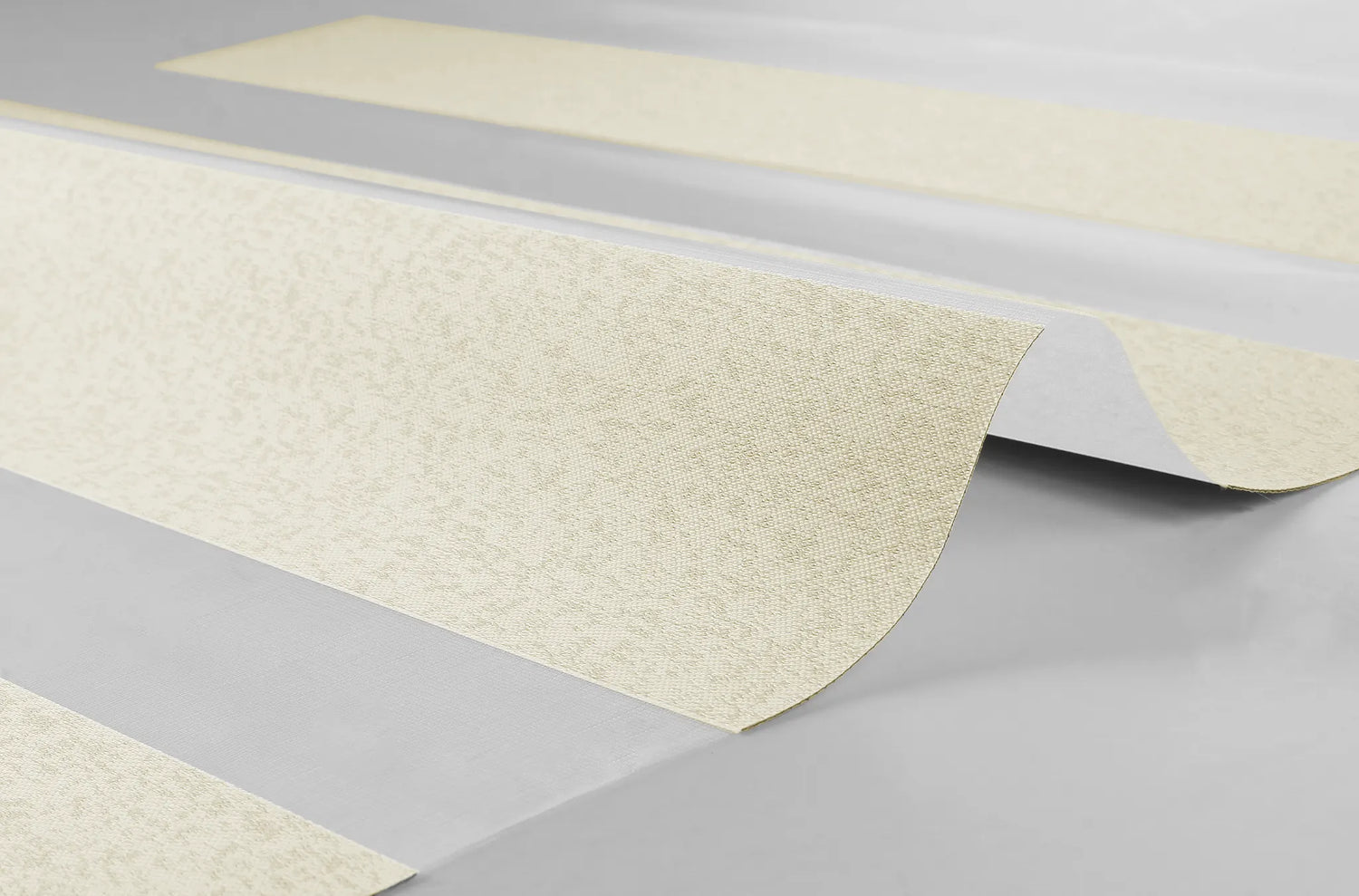 Close-up of Urban Weave speckled 90% blackout fabric for motorized zebra shades.