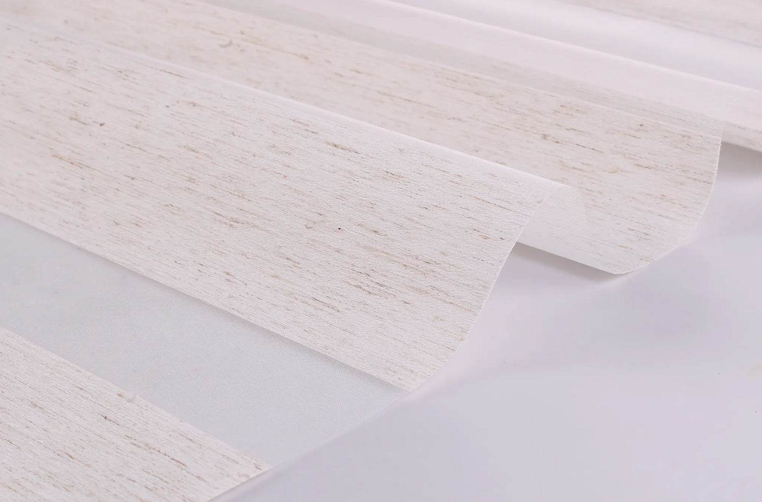 Close-up texture of Victoria Series linen-blend blackout fabric for zebra shades.